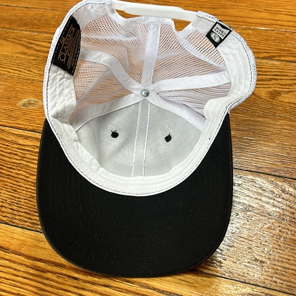 Salty Crew truckers snap back style cap. White mesh back with black front. - Picture 8 of 9